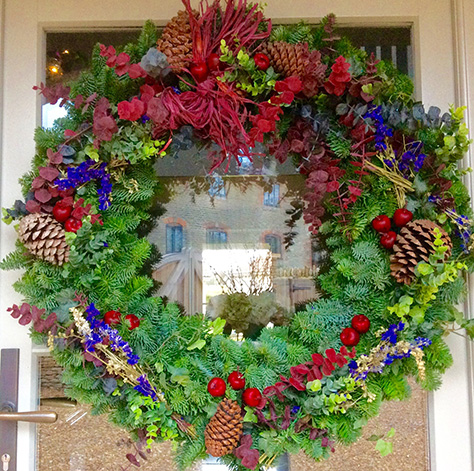 Wreath on a door with flowers