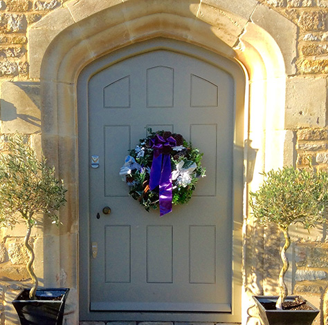 Wreath with Purple Ribbon